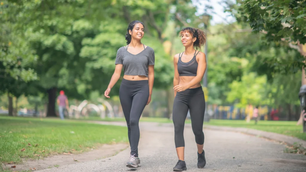 two woman walking